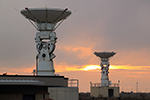 Two antennas at sunset