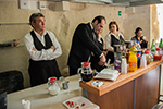 staff members serving drinks.