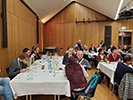 Attendees sitting at tables at the banquet
