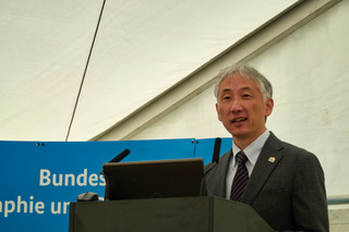 Toshimichi Otsubo at the podium