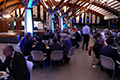 workshop attendees eating and listening to speakers at the banquet
