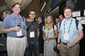 attendees and speakers at the Welcome address and reception